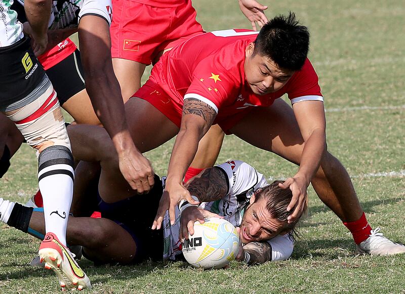 UAE and China in action during the Dialog Asia Rugby Sevens Series at Rugby Park in Dubai Sports City.