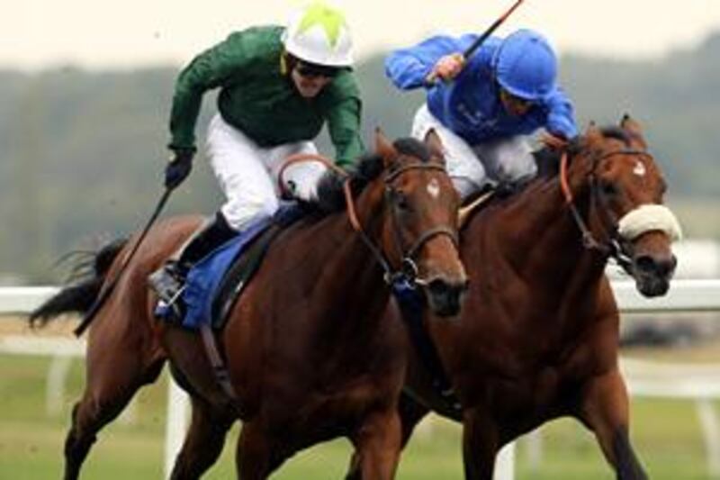 Frankie Dettori,on Campanologist, right, and Jim Crowley, on Look Here, during The Dubai Duty Free Arc Trial yesterday.