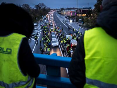 People wear yellow vests in Avignon protest against the rising prices of fuel on November 17, 2018. Getty Images