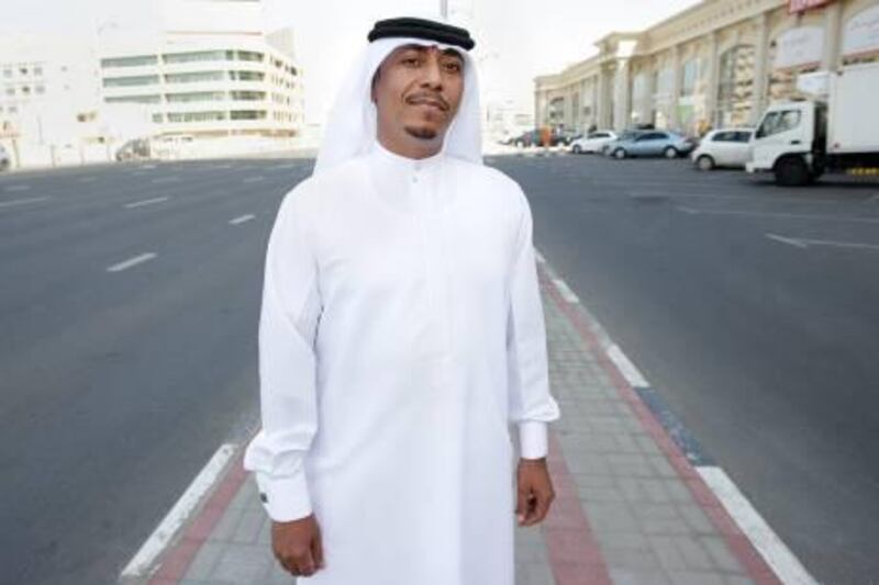 UAE - Dubai - Jan 30 - 2011: Mahmood Moosa Mohammed, the RTA Hero, pose for a portrait outside Ghazal Center  . Mr Mohammed has been honored by the Dubai Police on four separate occasions from helping apprehend thieves and bootleggers and for turning in cash and credit cards he found. ( Jaime Puebla - The National Newspaper )