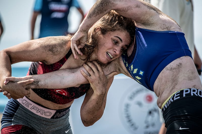 Hatice Ede Tekin (L) of Turkey wrestles Yulia Kremezna Malyk of Ukraine. 
