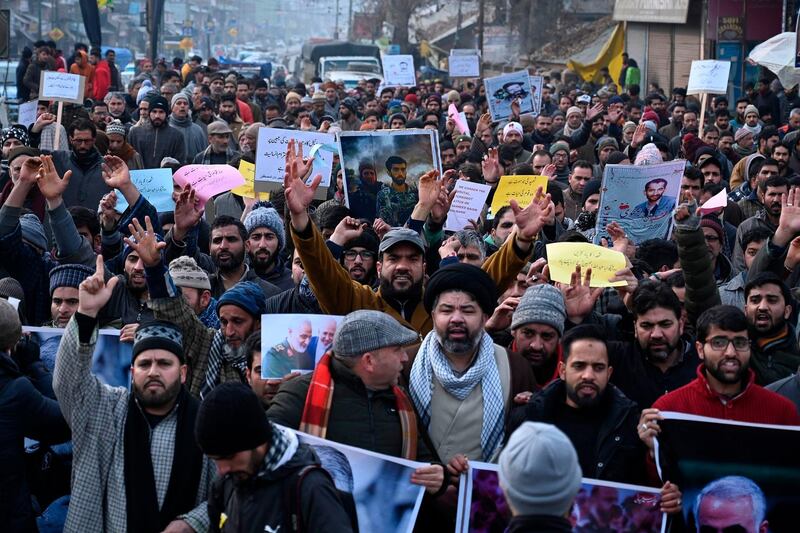 Protesters shout slogans against the United States and Israel in the Kashmiri town of Magam, India. AFP