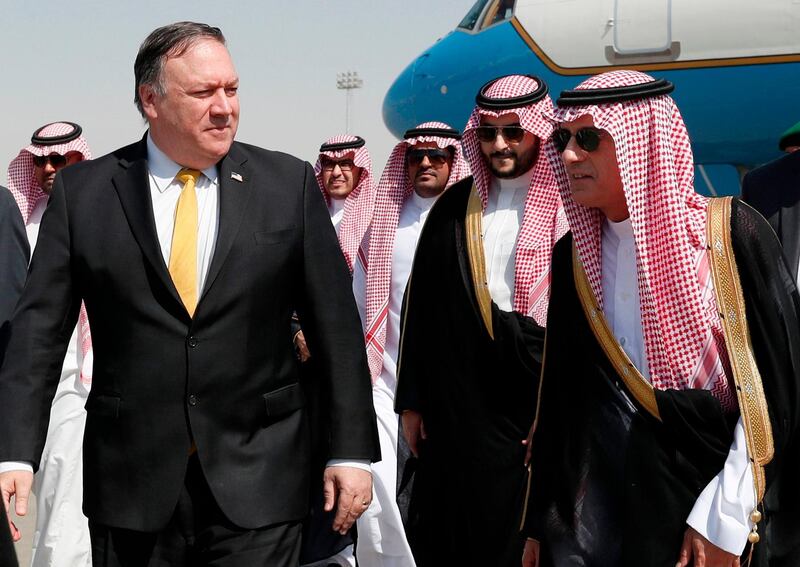 US Secretary of State Mike Pompeo, left, walks alongside Saudi Foreign Minister Adel Al Jubeir after arriving in Riyadh, Saudi Arabia. AFP
