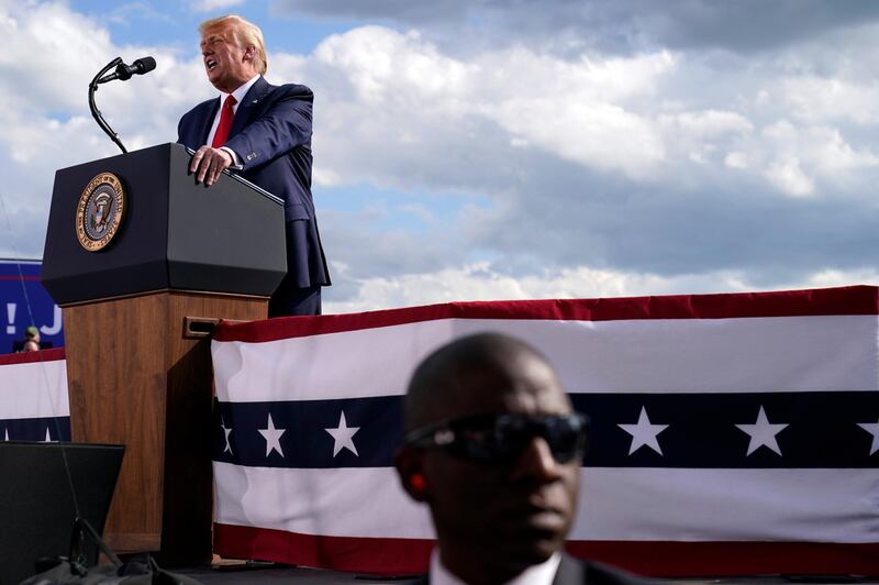 President Donald Trump speaks during a campaign rally at Wittman Airport in Oshkosh, Wis., on Monday, Aug. 17, 2020. (AP Photo/Evan Vucci)