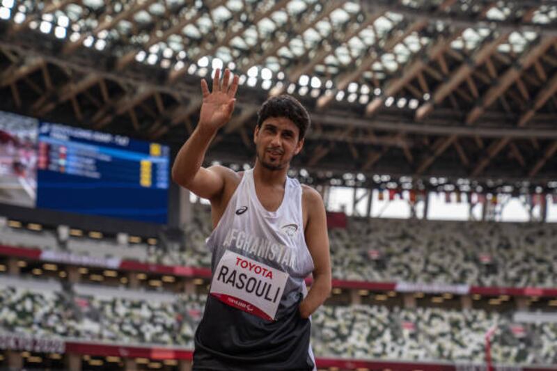 Hossain Rasouli waves after competing in the men's long jump T47 final. Getty