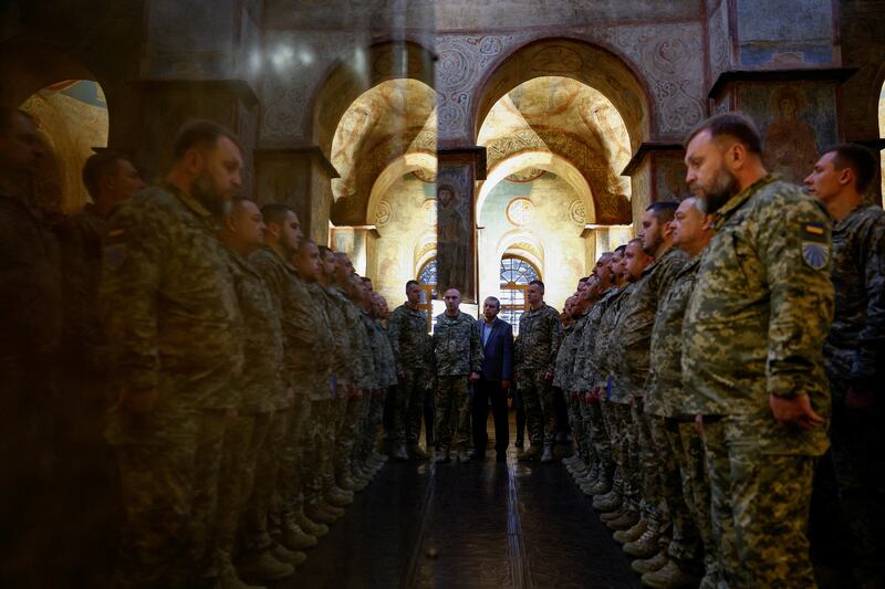 Ukrainian army chaplains attend a graduation ceremony, inside the Saint Sophia Cathedral in Kyiv. Reuters