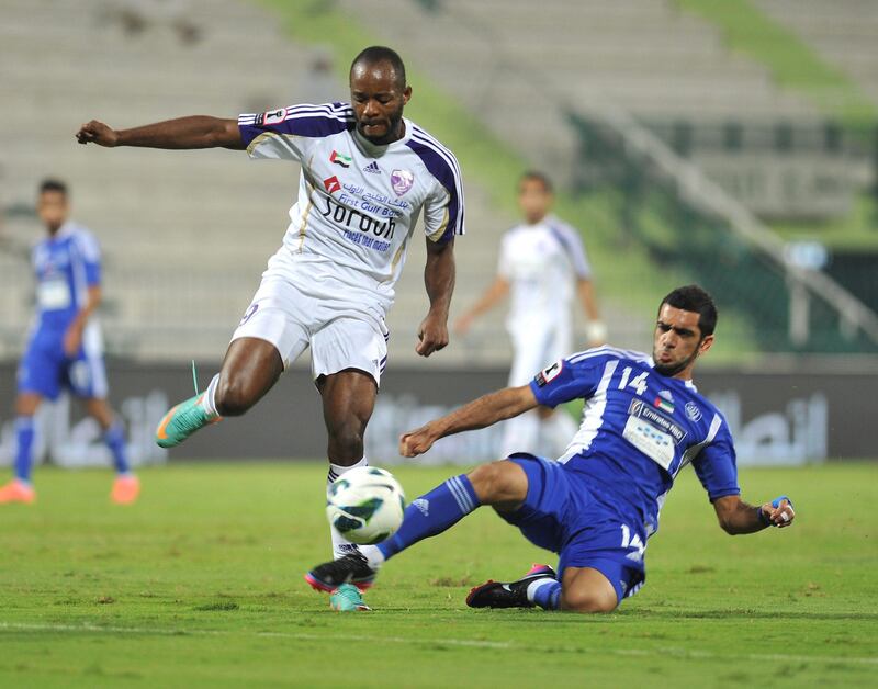 Al Nasr (Blue) matches up against Al Ain (White) at Al Maktoum Stadium on Tuesday November 13, 2012. (Al Ittihad)