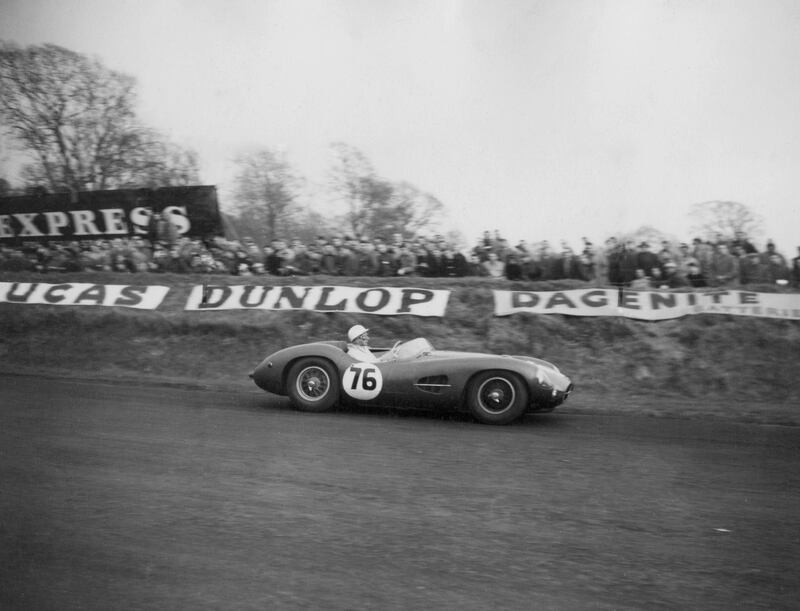 Stirling Moss, driving an Aston Martin, nears victory in the British Empire Trophy at Oulton Park in Cheshire in 1958. PA