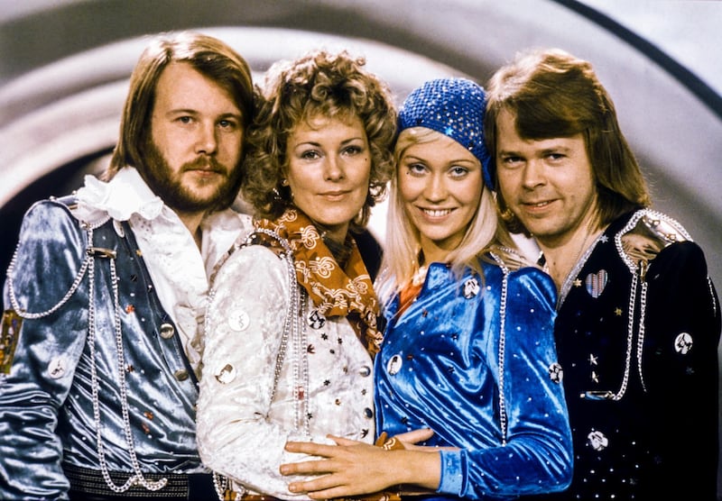 FILE - In this Feb. 9, 1974 file photo Swedish pop group Abba, from left: Benny Andersson, Anni-Frid Lyngstad, Agnetha Faltskog and Bjorn Ulvaeus posing after winning the Swedish branch of the Eurovision Song Contest with their song "Waterloo". The members of ABBA announced Friday April 27, 2018 that they have recorded new material for the first time in 35 years. (Olle Lindeborg/TT NEWS AGENCY via AP)