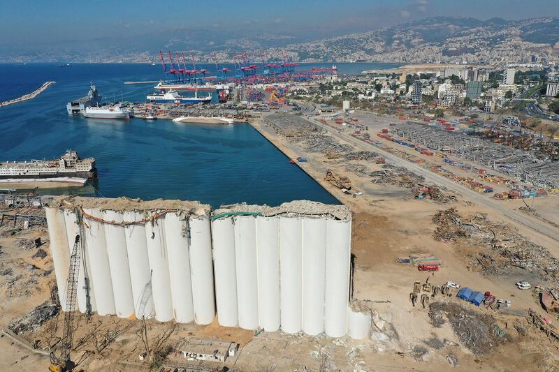 An aerial view taken on August 17, 2020, shows the damaged grain silos at the port of Beirut in the aftermath of a cataclysmic explosion that ripped through large parts of Lebanon's capital. - The August 4 explosion was caused by hazardous material left unsecured at the port for years, despite warnings over its danger, a fact that further enraged Lebanese who already saw the political class as incompetent and corrupt. (Photo by - / AFP)