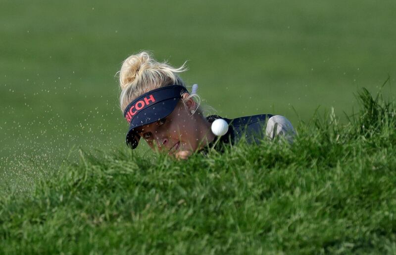 Charley Hull of England hits a shot out of a bunker on the 18th hole during the third round of the LPGA KEB Hana Bank Championship at Sky72 Golf Club in Incheon, South Korea. AP Photo