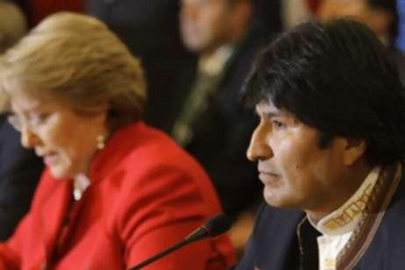 The Bolivian president Evo Morales, right, listens to Chile's president Michelle Bachelet, left, at a Union of South American Nations (UNASUR) summit in Santiago, Chile on Sept 15, 2008.