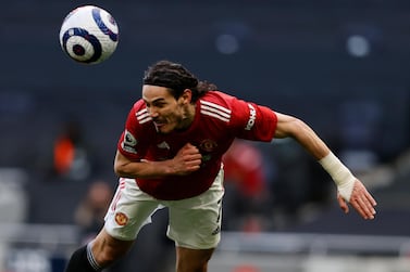 Manchester United's Edinson Cavani in action during the English Premier League soccer match between Tottenham Hotspur and Manchester United at the Tottenham Hotspur Stadium in London, Sunday, April 11, 2021. (Adrian Dennis/Pool via AP)