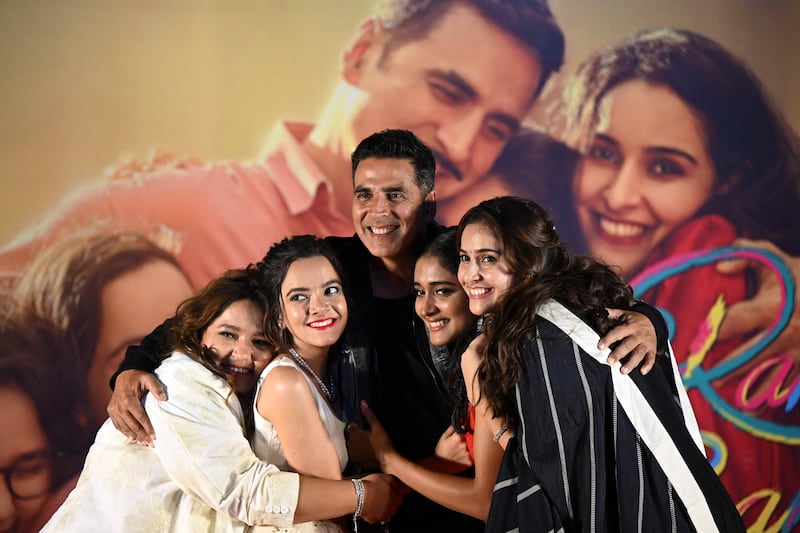 The cast of 'Raksha Bandhan' promote their film in Kolkata. AFP