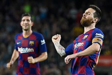 Barcelona forward Lionel Messi celebrates his first goal of the season in the 4-0 thrashing of Sevilla at Camp Nou. AFP