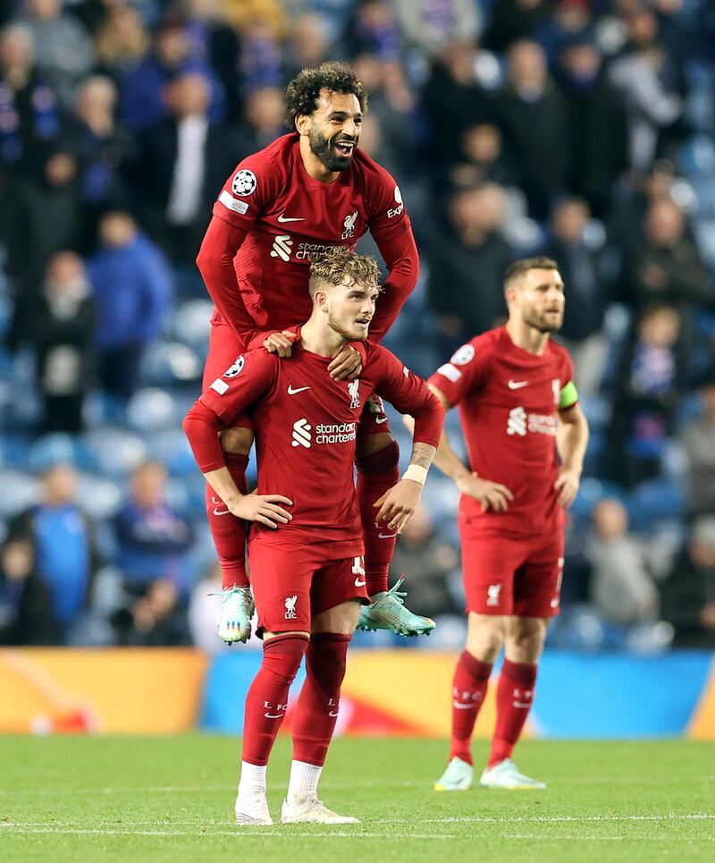 Harvey Elliott scored Liverpool's seventh goal and celebrated with Salah after a VAR check. PA