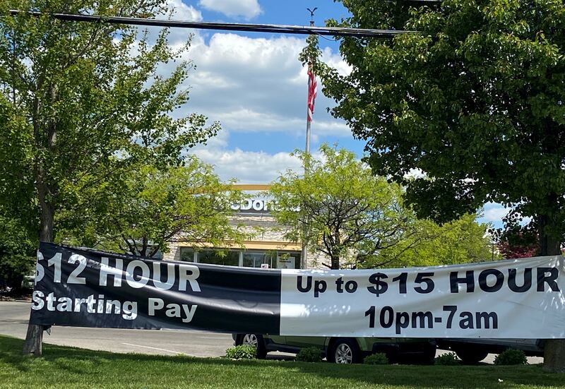 A banner inviting people to apply for jobs-outside a McDonald's in Bloomington, Indiana. Reuters