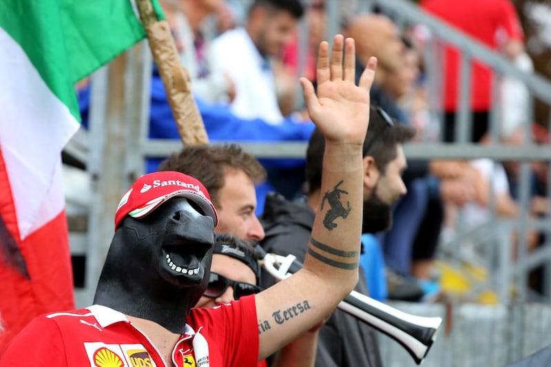 MONZA, ITALY - SEPTEMBER 01:  A Ferrari fan with a horse mask watches the action during qualifying for the Formula One Grand Prix of Italy at Autodromo di Monza on September 1, 2018 in Monza, Italy.  (Photo by Charles Coates/Getty Images)