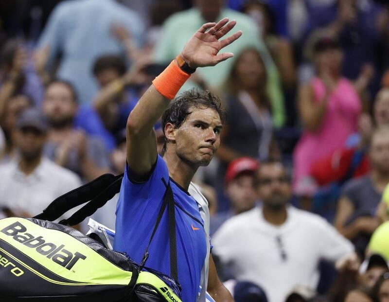 Rafael Nadal, of Spain, waves to fans after losing to Lucas Pouille, of France, during the fourth round of the US Open on Sunday, September 4, 2016, in New York. Alex Brandon / AP Photo
