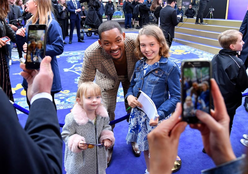 Smith poses with fans at the European Gala Screening. Getty Images.