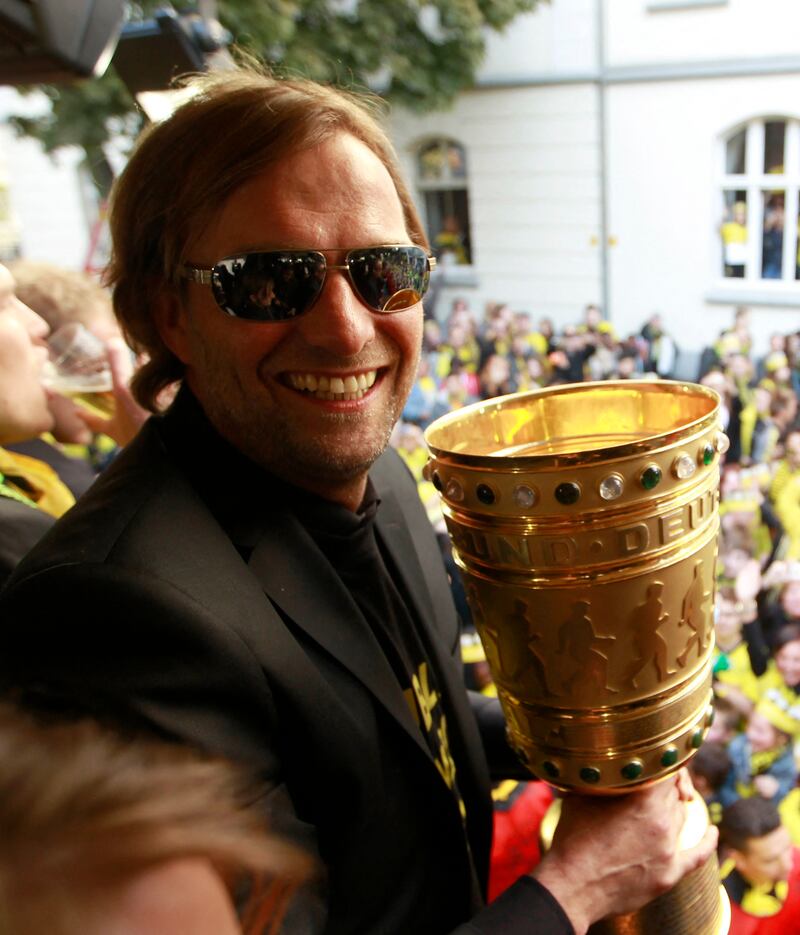 Dortmund coach Jurgen Klopp during a parade on May 13, 2012. Bundesliga champions Borussia Dortmund defeated  Bayern Munich 5-2 in the German Cup final on May 12, 2012 to claim the first domestic double in their 103-year history. AFP
