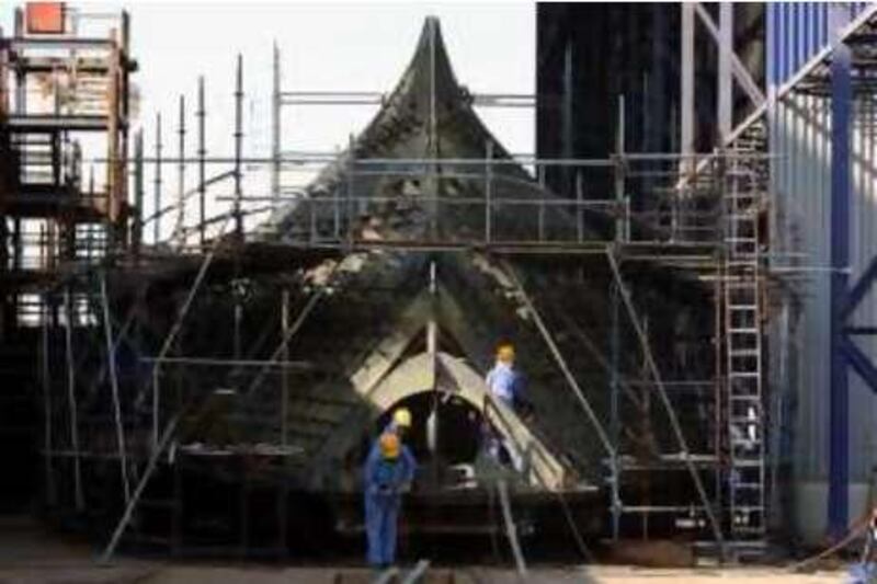 Abu Dhabi, UAE - December 14, 2008 -  Workers work on the bow of a military ship at ADSB. (Nicole Hill / The National) *** Local Caption ***  NH Ship01.jpg