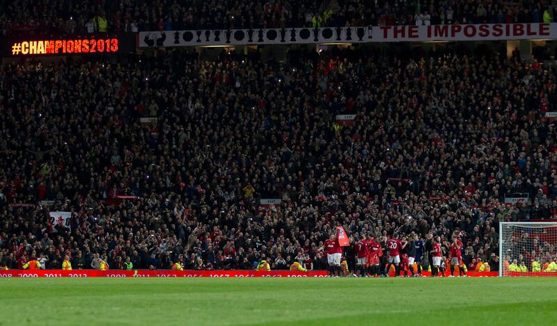 Manchester United players celebrate as they win their 20th English Premier League title after their 3-0 win over Aston Villa in their soccer match at Old Trafford Stadium, Manchester, England, Monday April 22, 2013. (AP Photo/Jon Super) *** Local Caption ***  Britain Soccer Premier League.JPEG-0f121.jpg