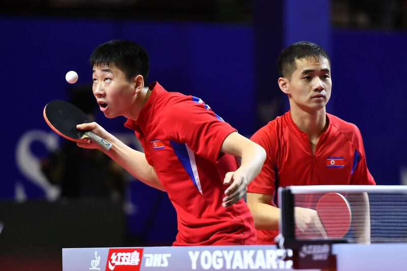 Ri Jong Sik and Ham Yu Song of NorthKorea compete at the ITTF-Asian Table Tennis Championships at Among Raga Stadium in Indonesia on Friday. Getty