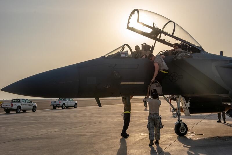 Engineers assigned to the 380th Expeditionary Aircraft Maintenance Squadron assist pilots arriving from the 336th Fighter Squadron at Al Dhafra Air Base in Abu Dhabi, UAE. Reuters