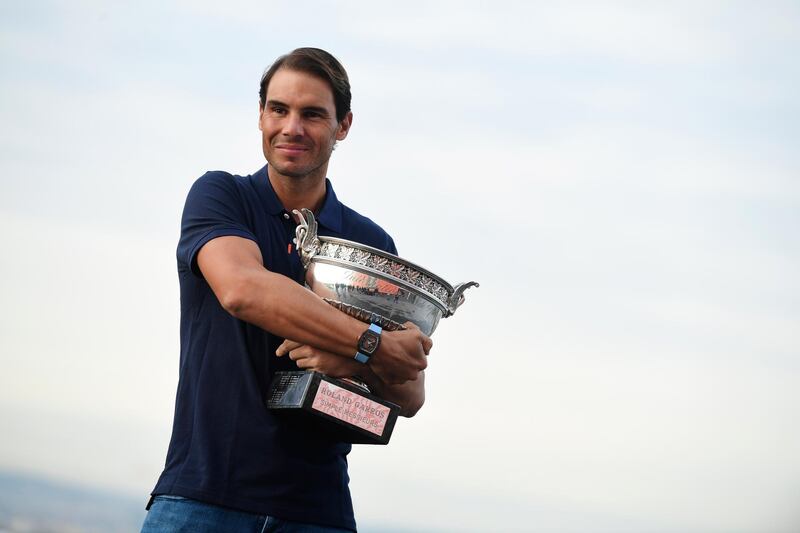Rafael Nadal poses with his trophy. EPA