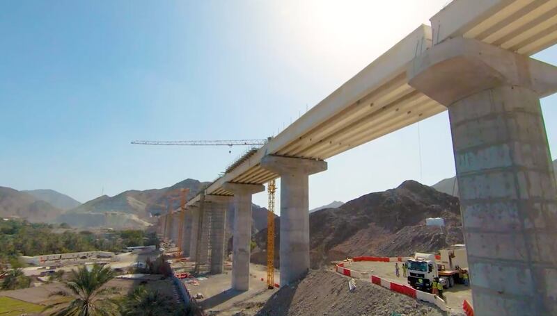 The bridge in the backdrop of picturesque mountains in the distance. Photo: Etihad Rail