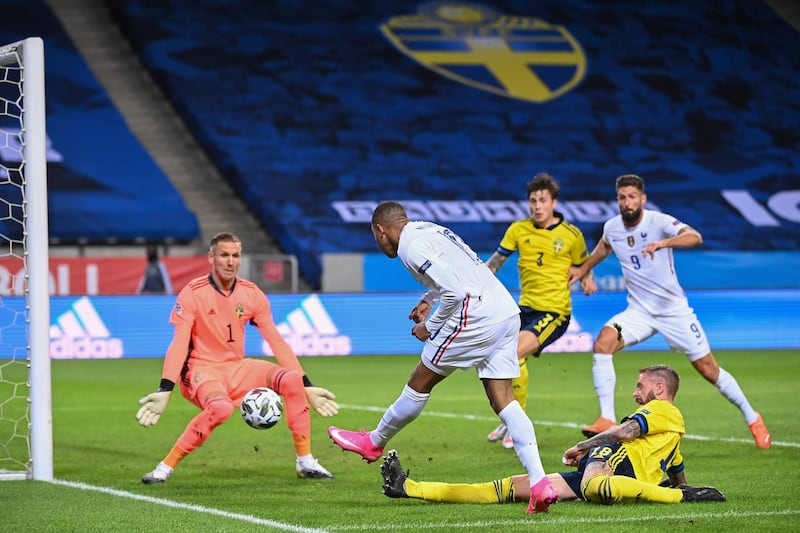 France's forward Kylian Mbappe scores the opening goal. AFP