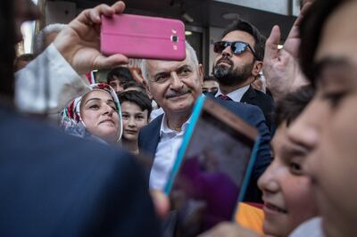 *** BESTPIX *** ISTANBUL, TURKEY - JUNE 18: Istanbul mayoral candidate Binali Yildirim of the ruling Justice and Development Party (AKP) meets with supporters during a campaign street stop on June 18, 2019 in Istanbul, Turkey. Preparations continue ahead of the June 23 re-run mayoral election for Istanbul after Istanbul mayoral candidate Ekrem Imamoglu of the Republican Peoples Party (CHP) won a narrow victory over the AKP party candidate during the first mayoral election held in March, however weeks later Turkeys election body annulled the result after claims of voting irregularities, and a re-run election was announced for June 23.  (Photo by Chris McGrath/Getty Images)