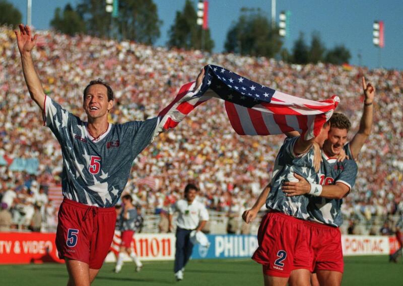 There were worries prior to the 1994 tournament that the United States would be the first host nation to not advance out of the Group stage, but with a 2-1 win over Colombia, Thomas Dooley, left, and his teammates reached the knockout round. Shaun Botterill / Allsport

