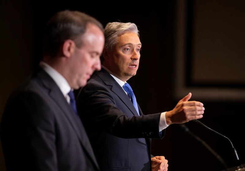 Canada's Foreign Minister Francois-Philippe Champagne (R) and Britain's Foreign Secretary Dominic Raab speak during a news conference in Montreal, Quebec, Canada January 9, 2020.  REUTERS/Christinne Muschi