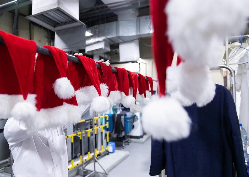 DUBAI, UNITED ARAB EMIRATES. 20 DECEMBER 2020. 
Santa hats hanging in the laundry facility at Radisson Blu Hotel, Dubai Deira Creek.
(Photo: Reem Mohammed/The National)

Reporter: Patrick Ryan
Section: