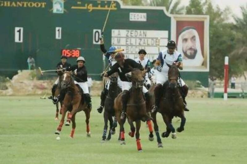 Zedan of Saudi Arabia, in white, defeated Habtoor of Dubai 9-6 to clinch the President of the UAE Cup title.