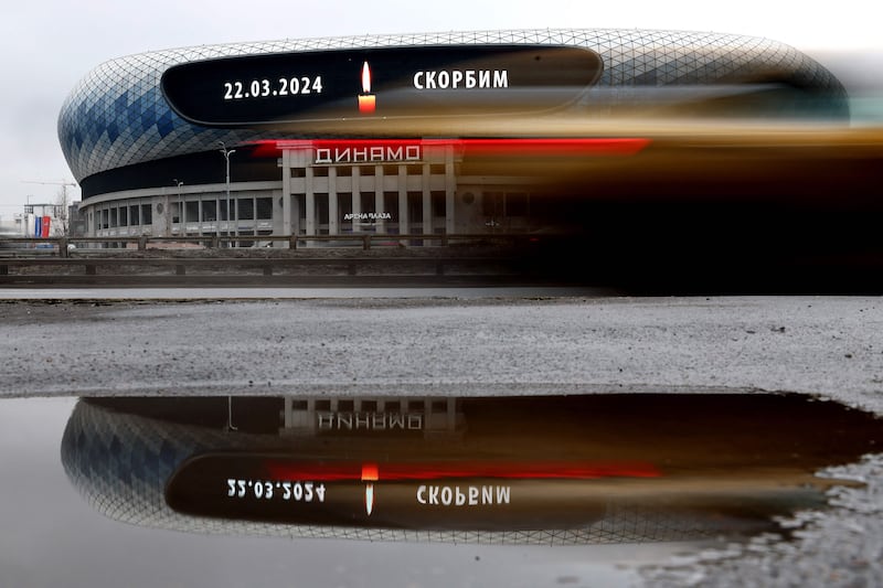 An advertising screen at the VTB Arena displays an image of a lit candle, in Moscow. AFP