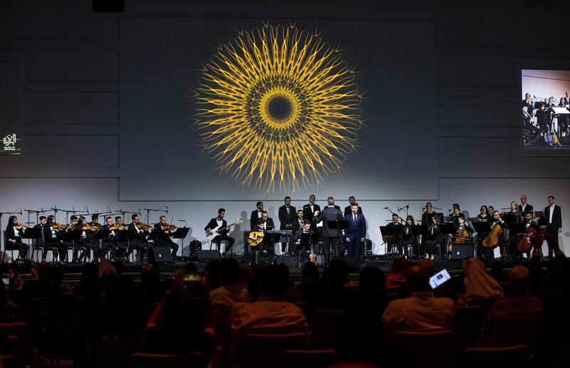 An orchestra performs at Al Burda Award ceremony on the opening night of Al Burda Festival.