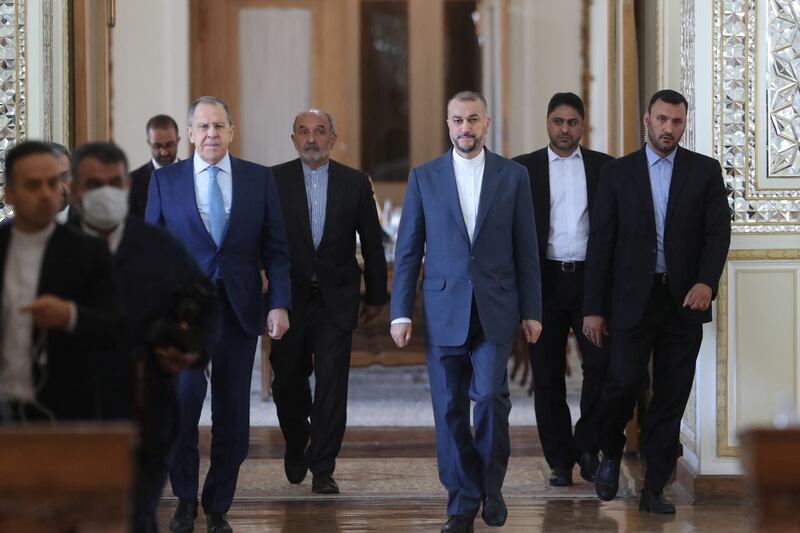 Iranian Foreign Minister Hossein Amir-Abdollahian and Russian Foreign Minister Sergey Lavrov arrive for a joint news conference in Tehran on Thursday. Reuters