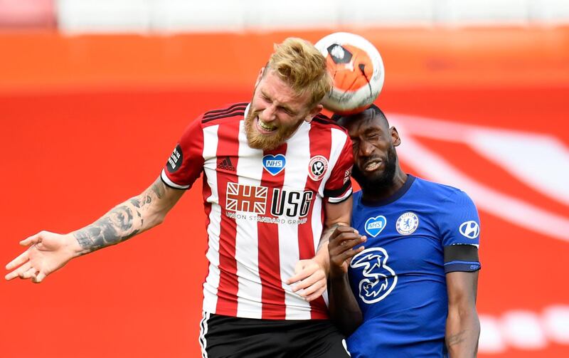 Sheffield United's Oliver McBurnie in action with Chelsea's Antonio Rudiger. Reuters