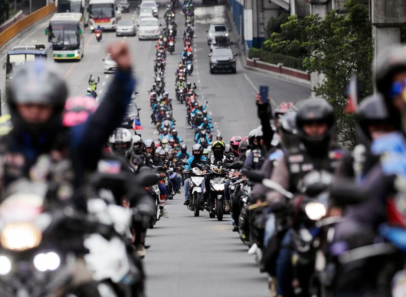 Members of Riders of the Philippines stage a motorcade to protest government policies on motorbikes, in Quezon City, east of Manila, Philippines. EPA