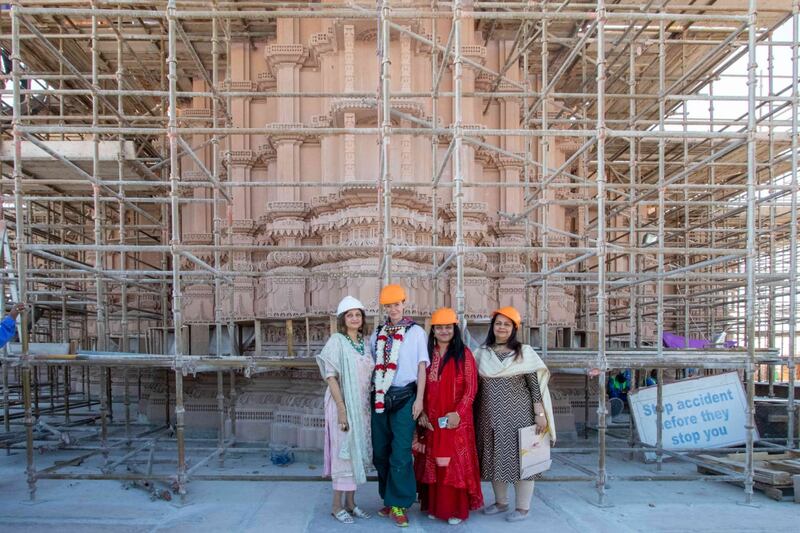 Pink sandstone carved in Rajasthan, India, is being used at the site in Abu Dhabi 