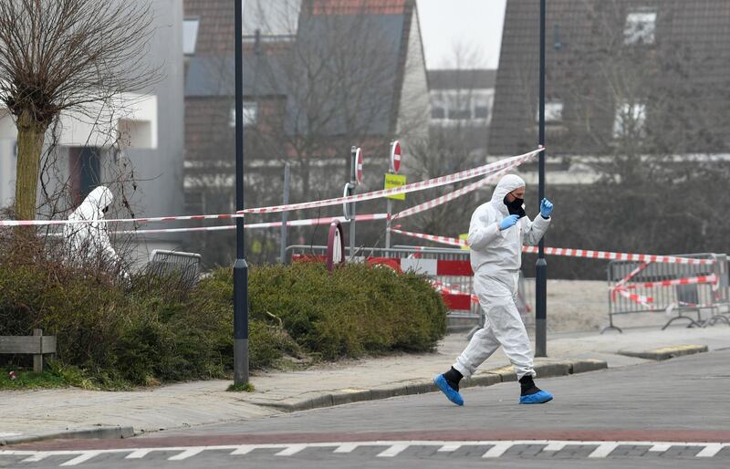 Forensics officers investigate the area. Reuters