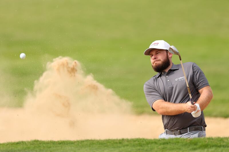 Great Britain & Ireland's Tyrell Hatton plays his third shot on the 14th hole during his 5&4 win over Antoine Rozner. Getty