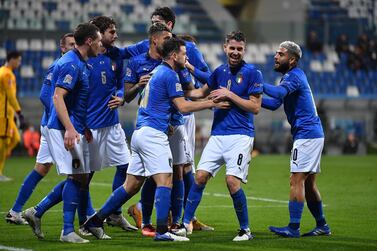 REGGIO NELL'EMILIA, ITALY - NOVEMBER 15: Jorginho (C) of Italy celebrates the opening goal from the penalty spot with team mates during the UEFA Nations League group stage match between Italy and Poland at Mapei Stadium - Citta' del Tricolore on November 15, 2020 in Reggio nell'Emilia, Italy. (Photo by Valerio Pennicino/Getty Images)