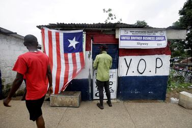 The Liberian national flag on a booth in Monrovia. EPA