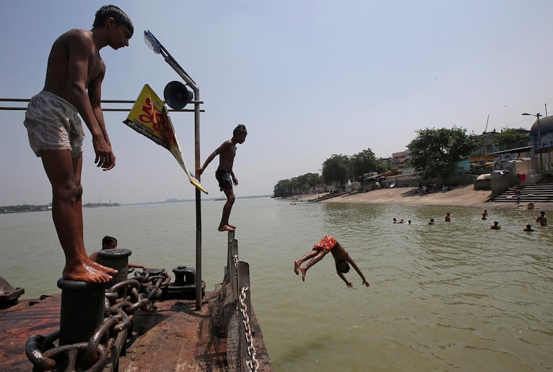 Boys jump into the Ganges to cool off on a hot day in Kolkata, India. Rupak De Chowdhuri / Reuters