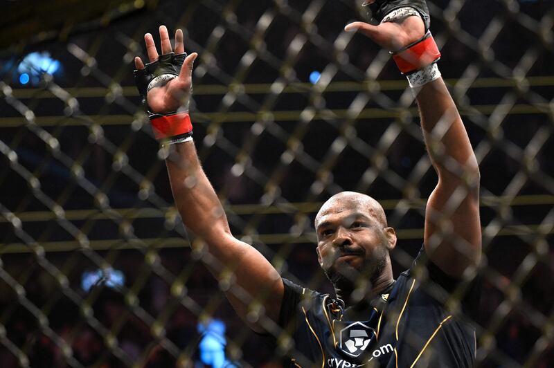 Jon Jones celebrates after defeating Ciryl Gane in their UFC 285 heavyweight title bout. AFP