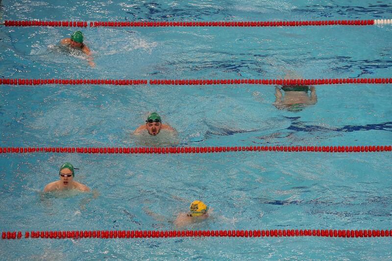 DUBAI , UNITED ARAB EMIRATES , March 20 – 2019 :- Swimmers after participating in the 4x50m freestyle relay at the Special Olympic games held at Hamdan Sports Complex in Dubai. ( Pawan Singh / The National ) For News/Instagram/Online/Big Picture . Story by Ramola